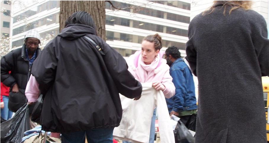 Handing out Clothes to homeless people